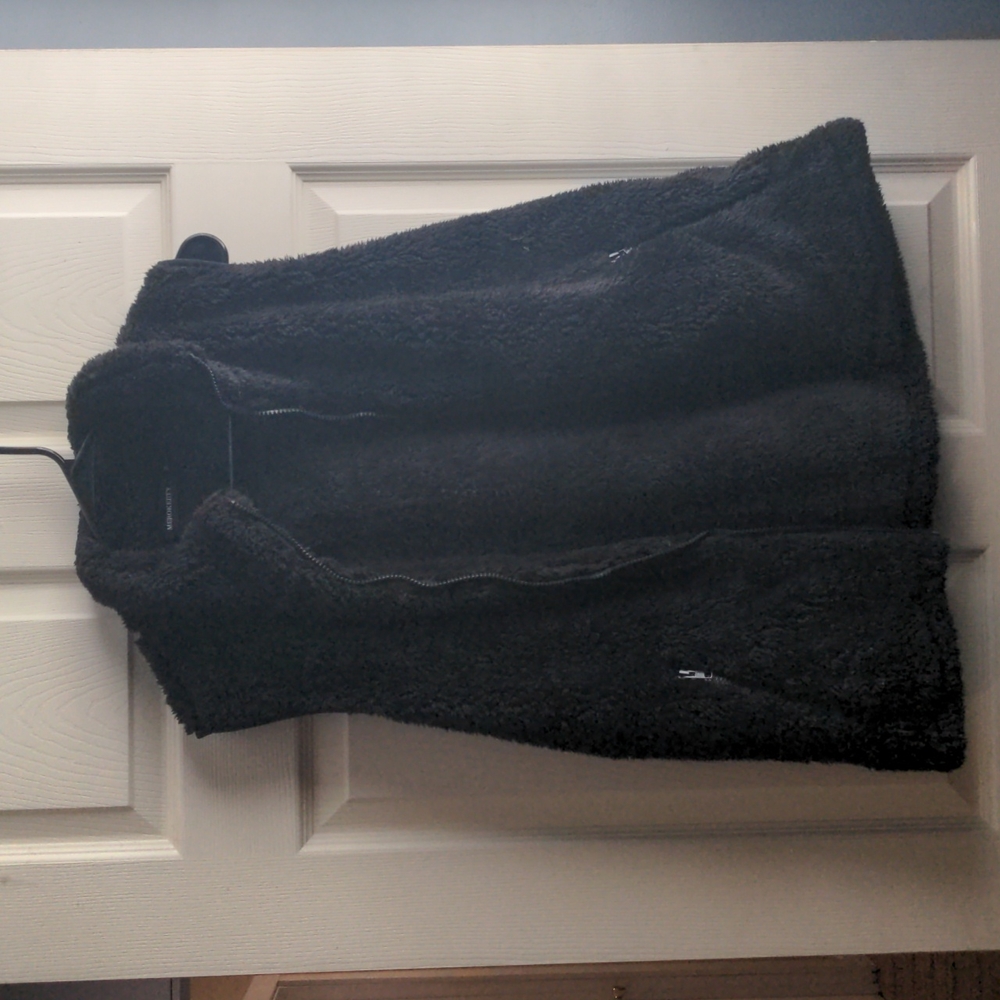 Unworn black faux fur vest
